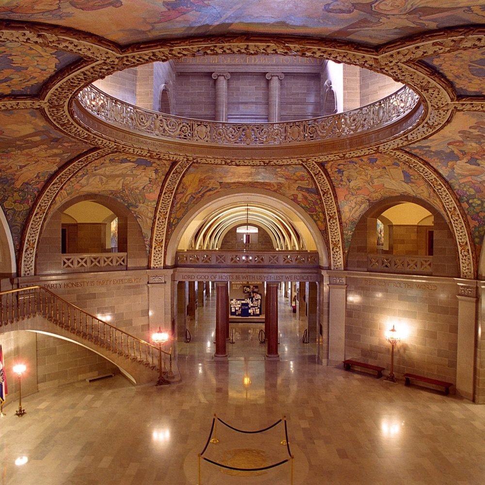 Grand lobby area with mural on ceiling of State Capitol Building