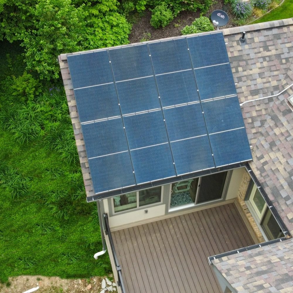 4x4 solar panel grid on top of roof of home