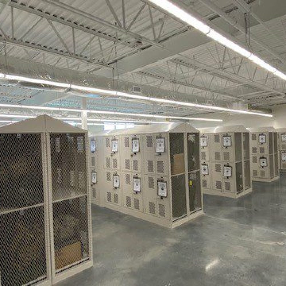 White cages in utility room at TASMG READINESS CENTER